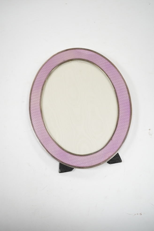 A modern Italian 925 and guilloche enamel mounted oval photograph frame, 22.8cm. Condition - fair to good